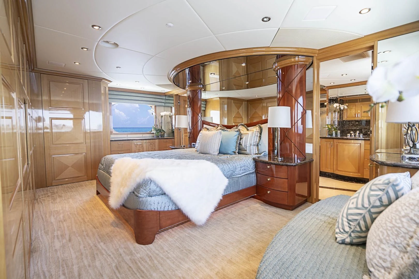 a large bedroom with a large bed aboard SEAQUEST Yacht for Sale