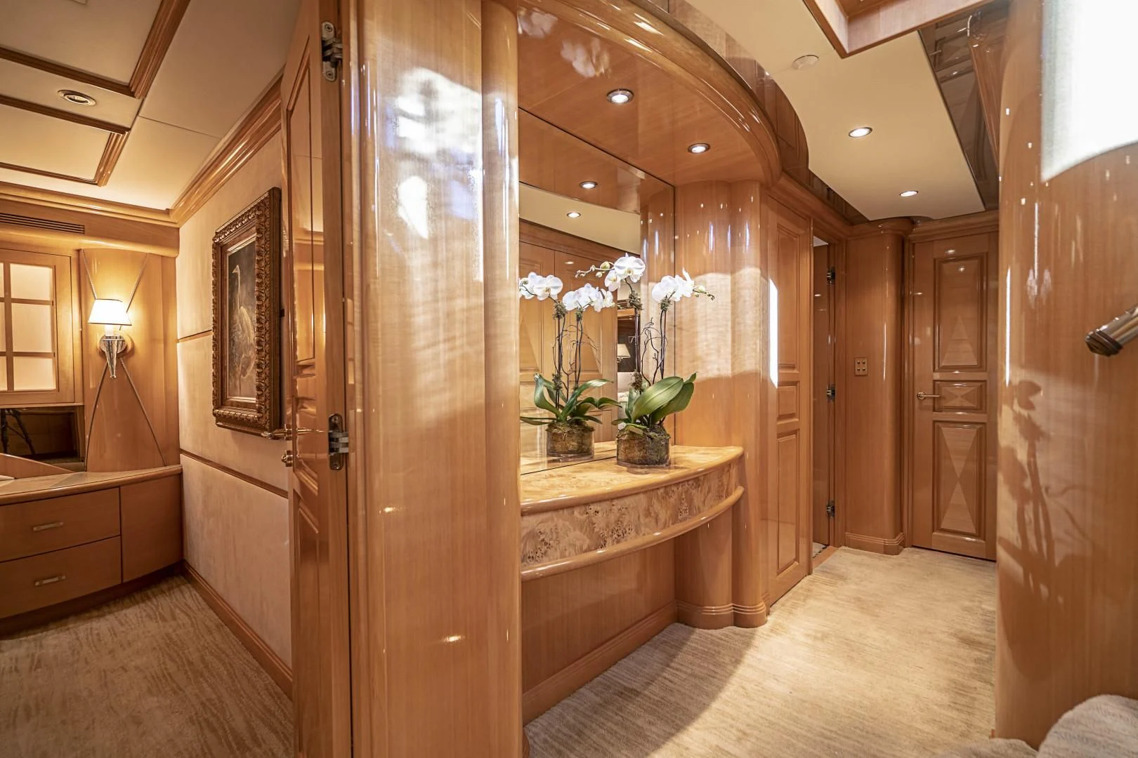 a bathroom with a large wood door aboard SEAQUEST Yacht for Sale