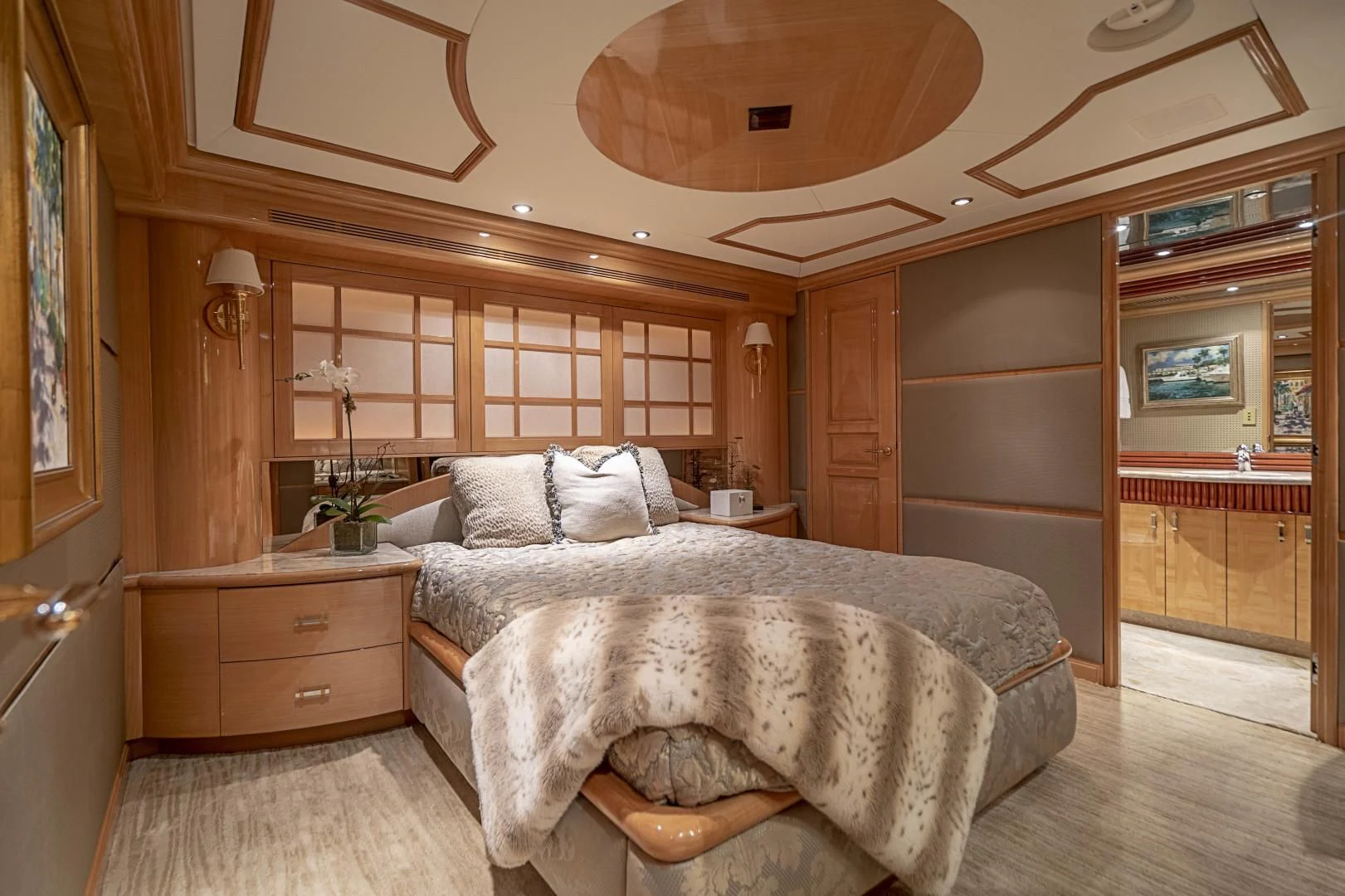a large bedroom with a large bed aboard SEAQUEST Yacht for Sale