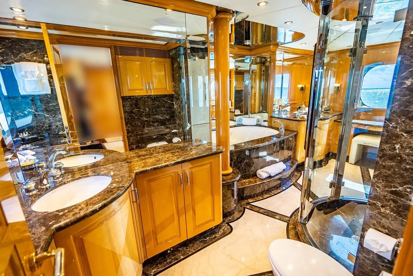 a bathroom with a large mirror aboard SEAQUEST Yacht for Sale