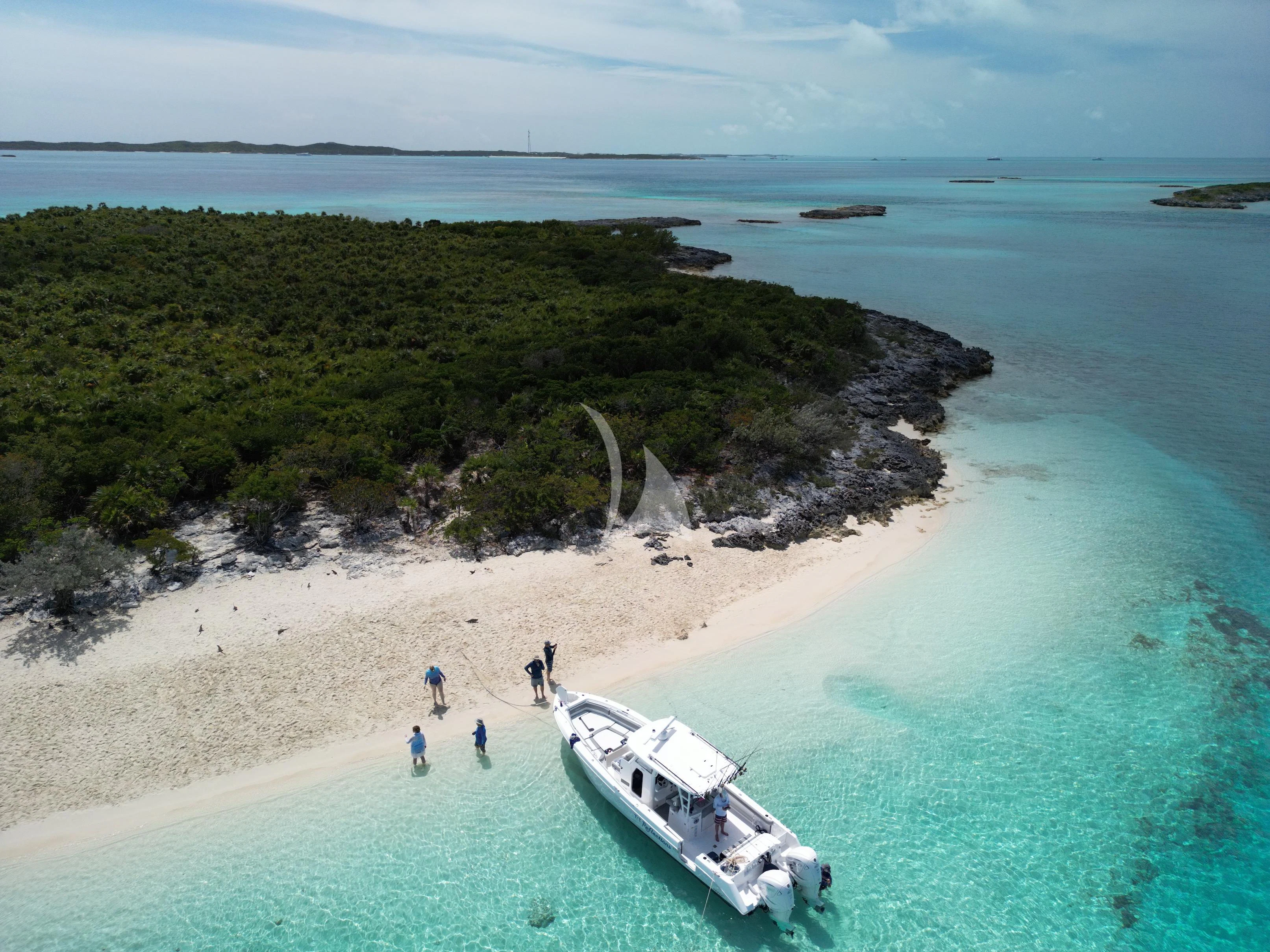 a boat on a beach aboard SEAQUEST Yacht for Sale