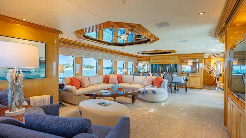 a living room with a large mirror aboard SEAQUEST Yacht for Sale