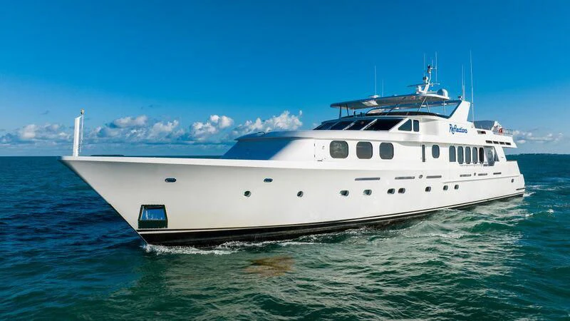 a large white boat in the water aboard SEAQUEST Yacht for Sale