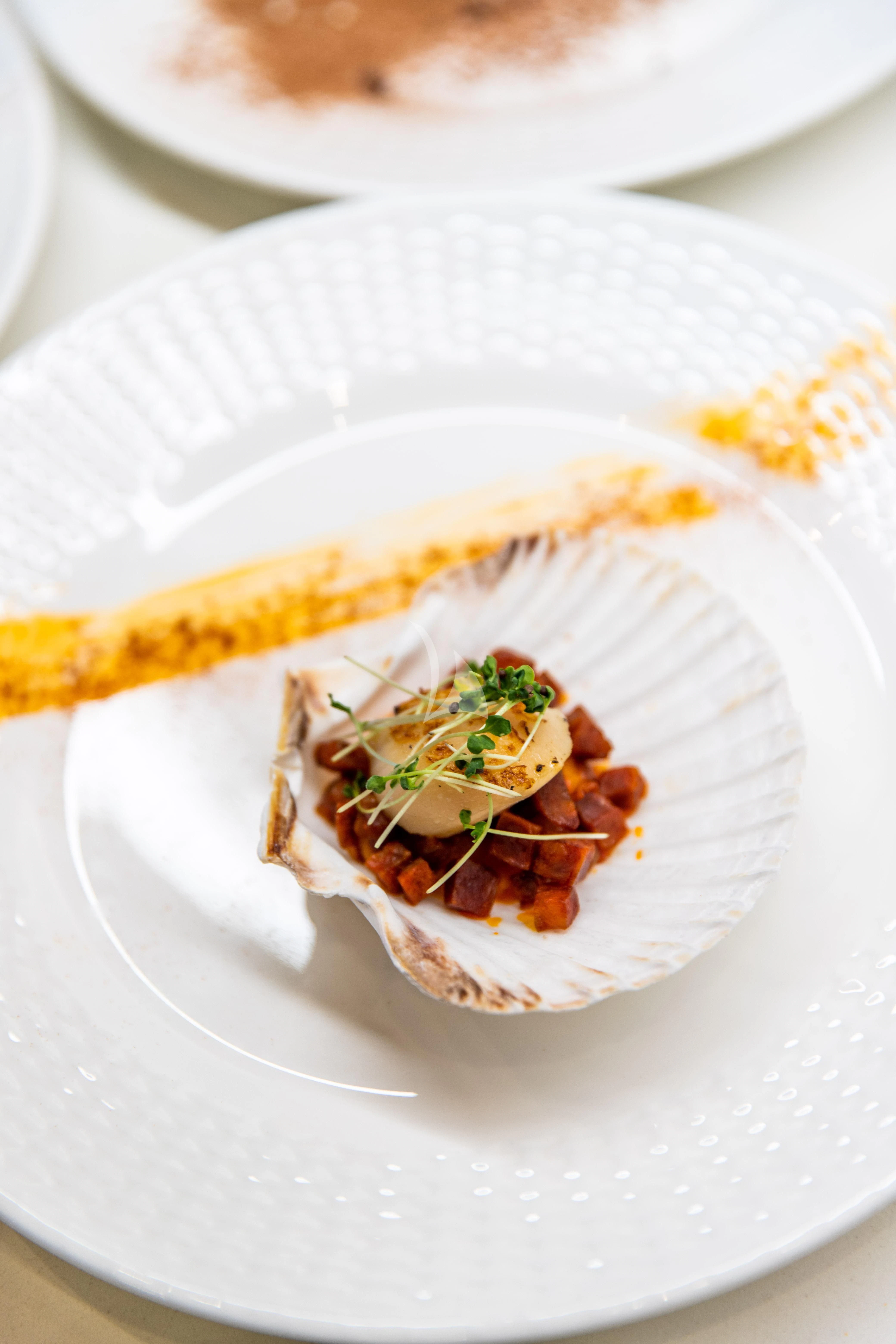 a plate of food aboard SEAQUEST Yacht for Sale