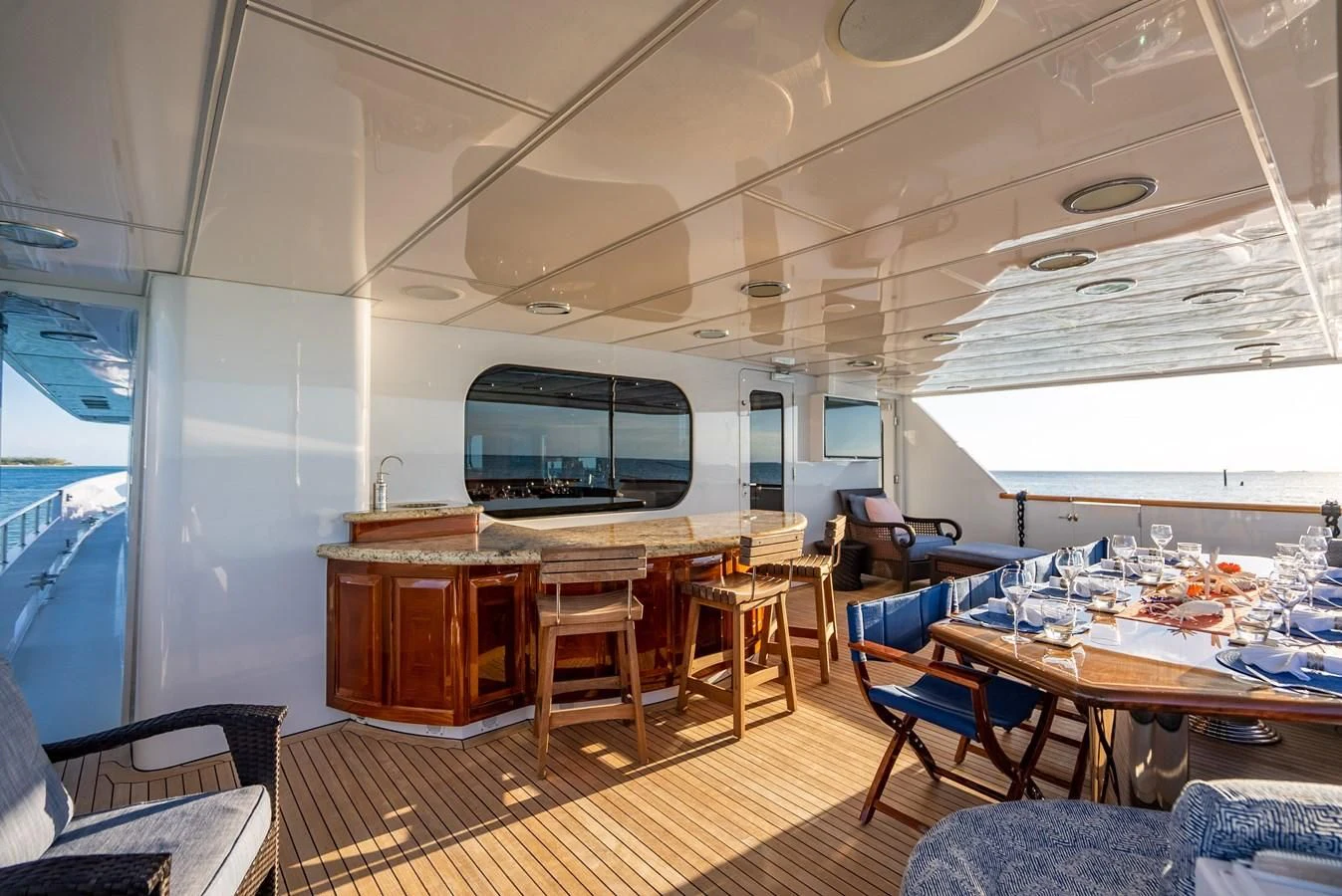 a room with a table and chairs aboard SEAQUEST Yacht for Sale