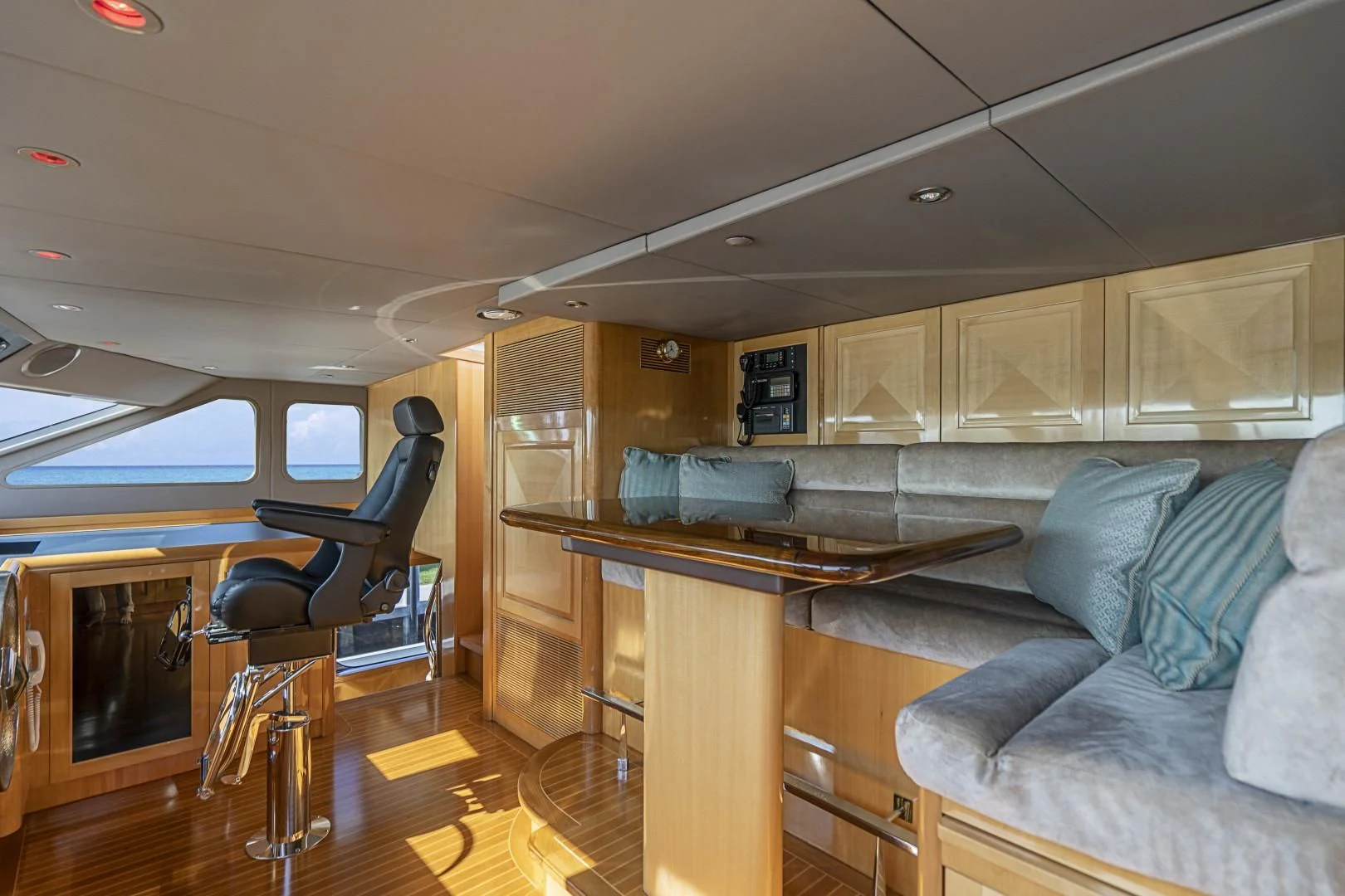 a room with a couch and a table aboard SEAQUEST Yacht for Sale