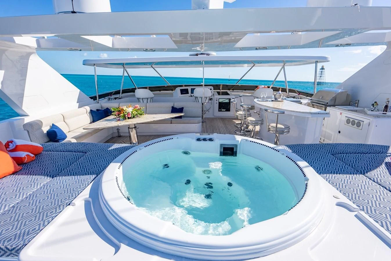 a pool with a large blue pool aboard SEAQUEST Yacht for Sale
