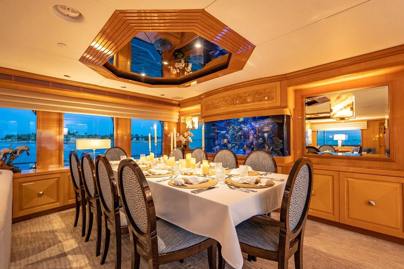 a dining room with a table and chairs aboard SEAQUEST Yacht for Sale
