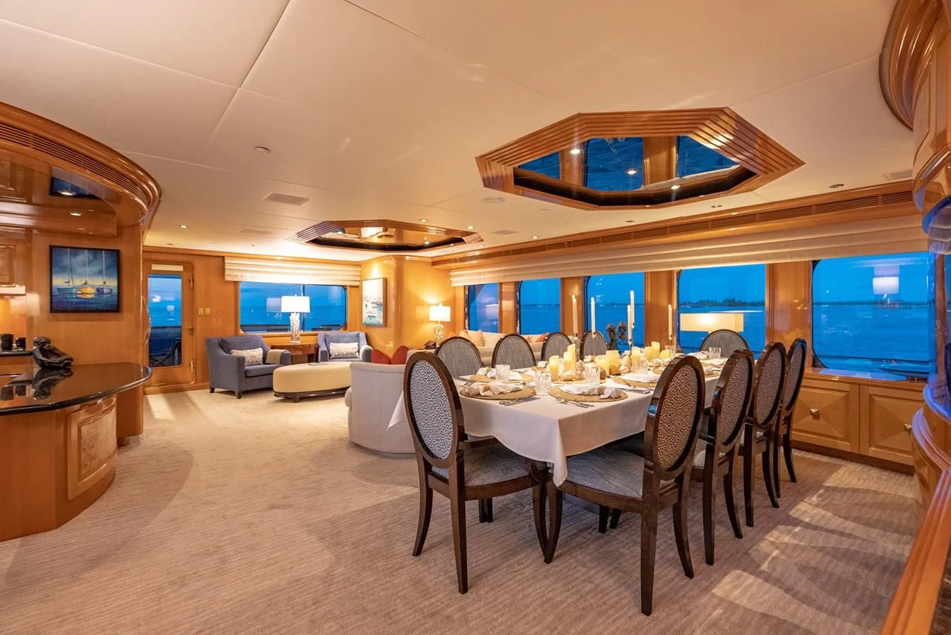 a room with a table and chairs aboard SEAQUEST Yacht for Sale