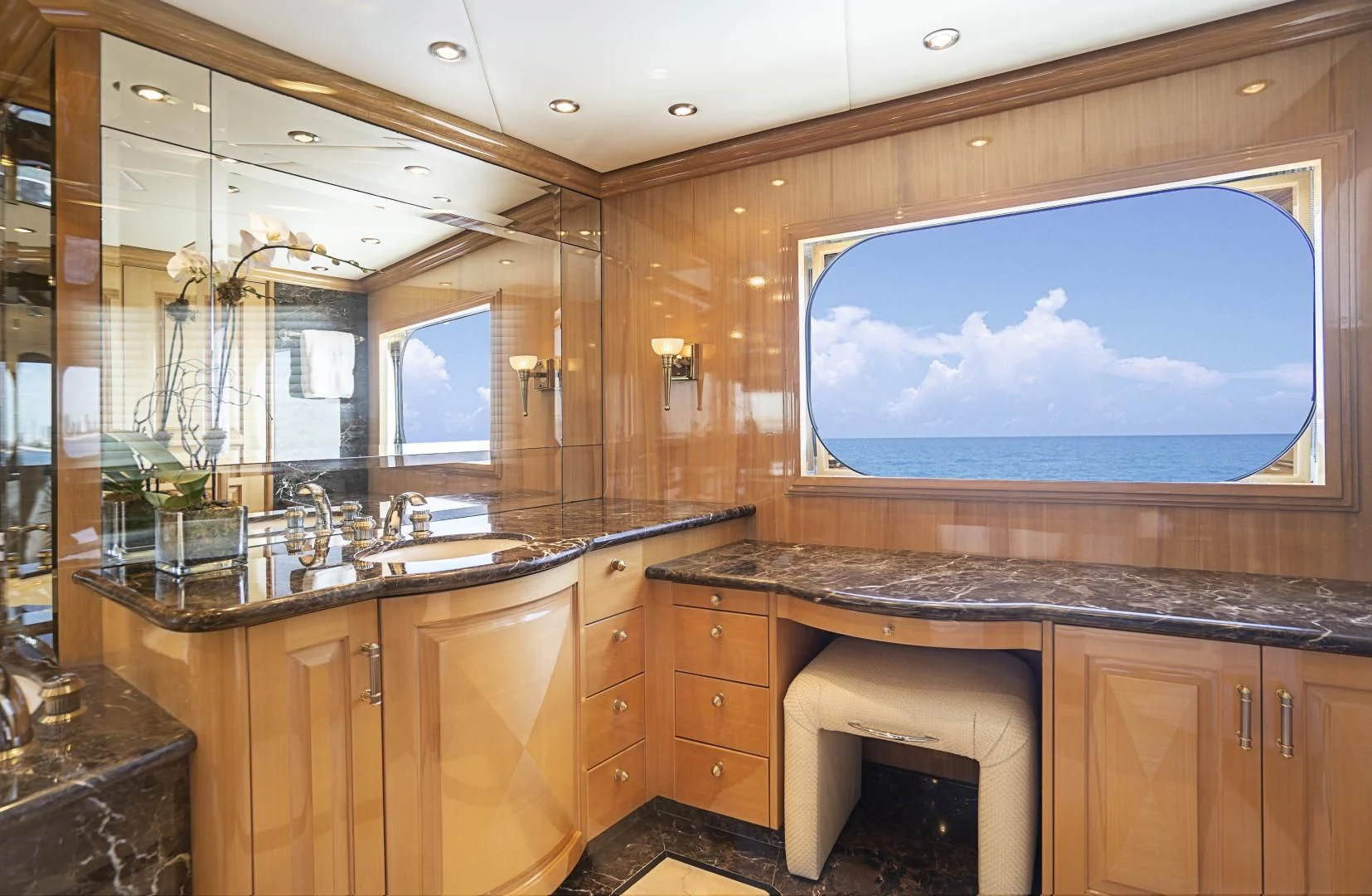 a large bathroom with a large tv aboard SEAQUEST Yacht for Sale