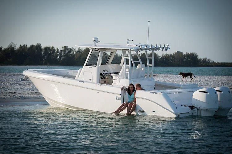 a person and a child on a boat in the water aboard SEAQUEST Yacht for Sale