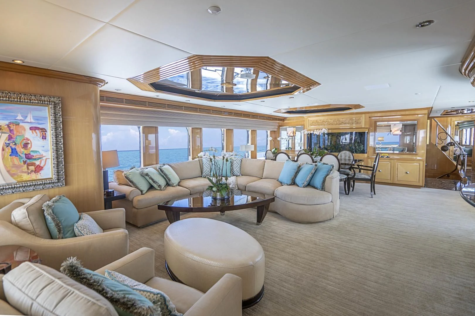 a living room with a large window aboard SEAQUEST Yacht for Sale