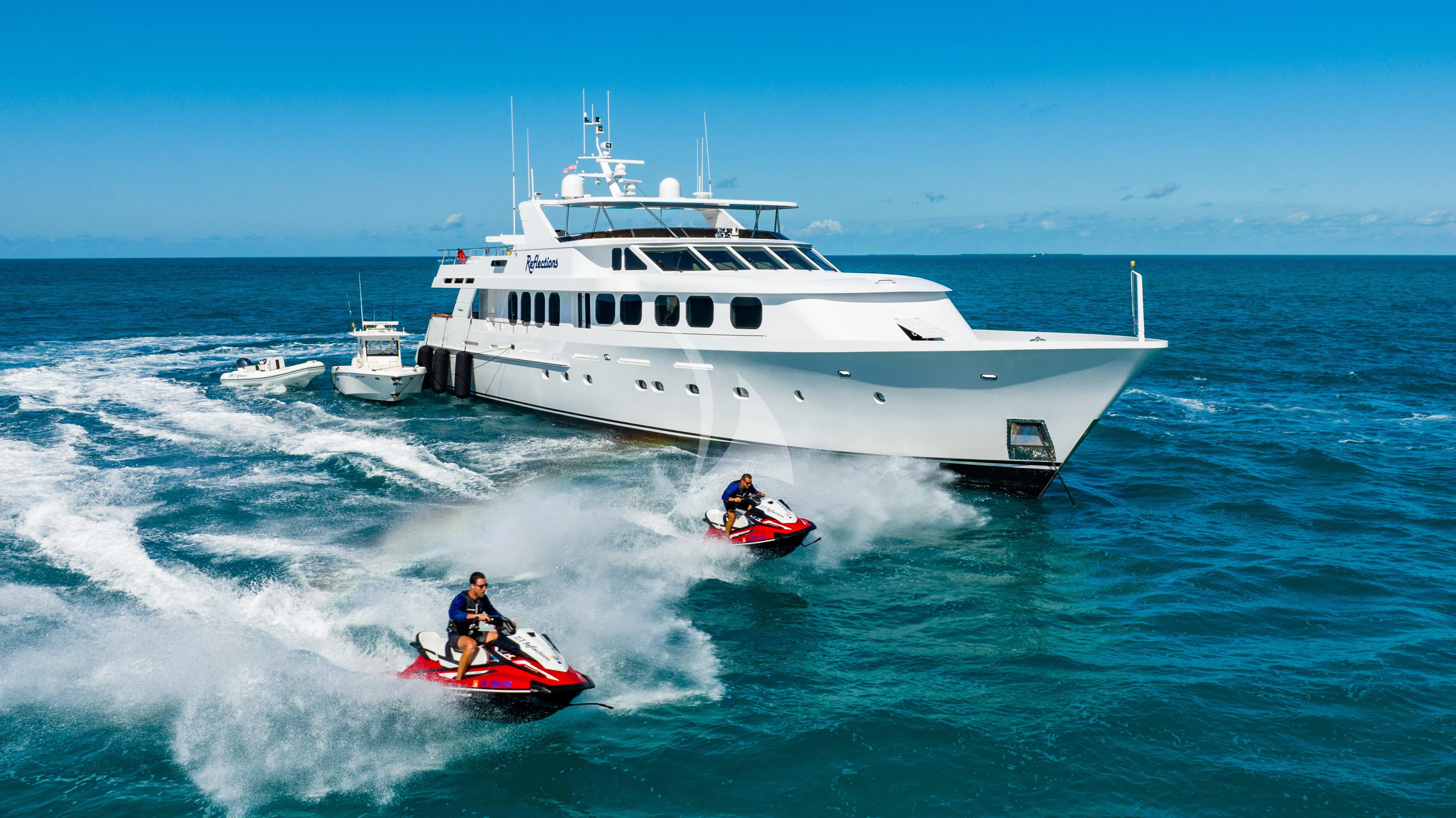 a boat and a boat on the water aboard SEAQUEST Yacht for Sale
