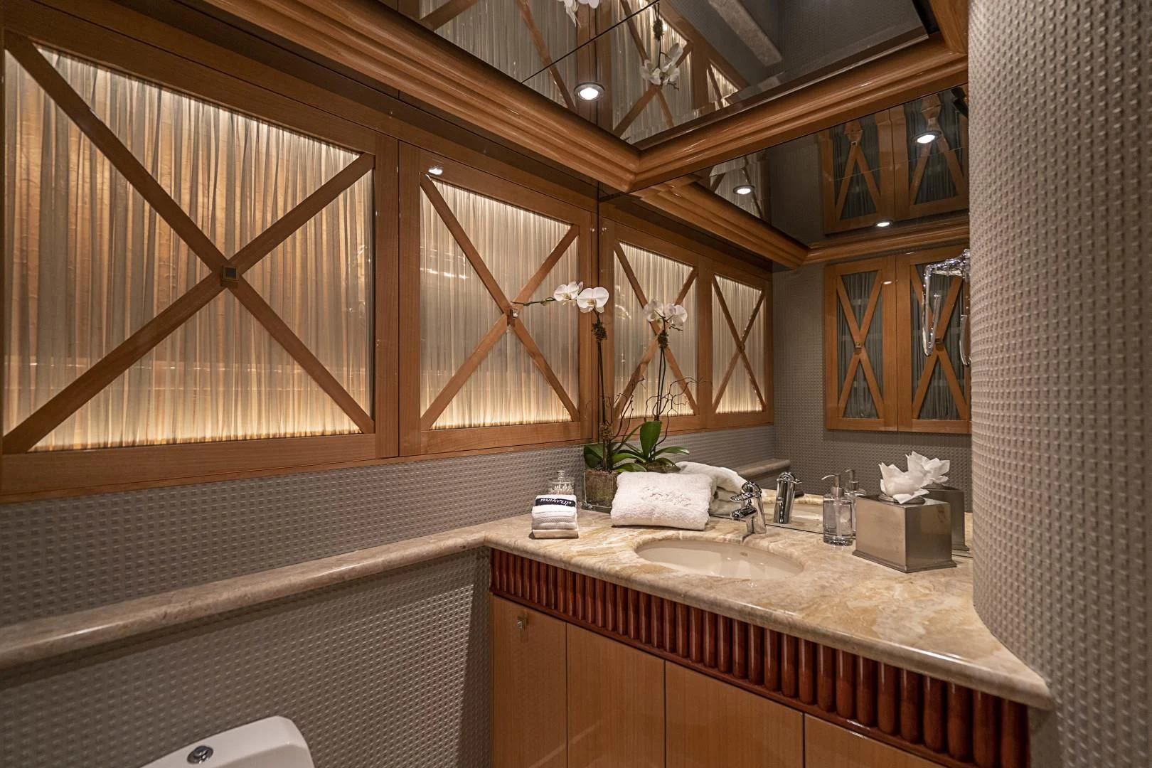 a bathroom with a large mirror aboard SEAQUEST Yacht for Sale