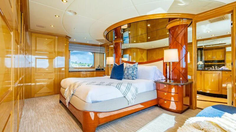 a large bedroom with a large bed aboard SEAQUEST Yacht for Sale