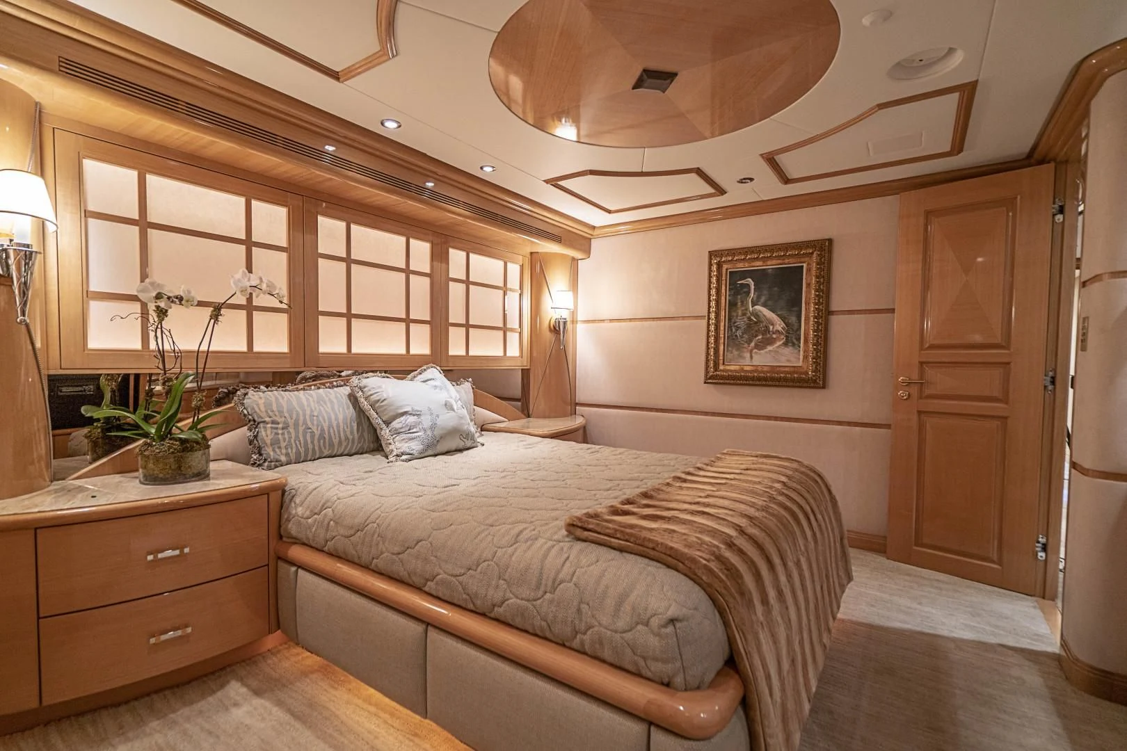 a large bed in a room aboard SEAQUEST Yacht for Sale