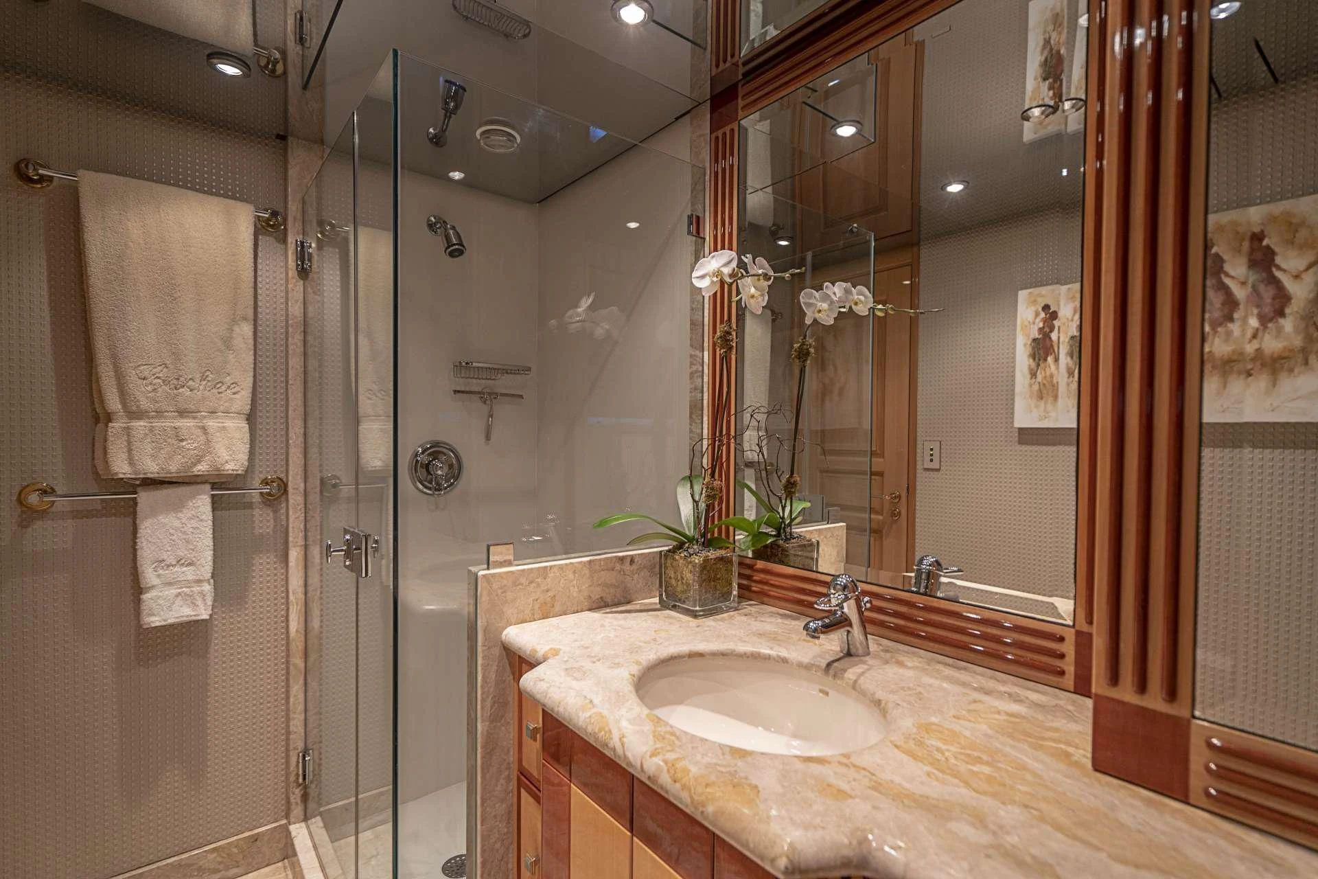 a bathroom with a shower and sink aboard SEAQUEST Yacht for Sale