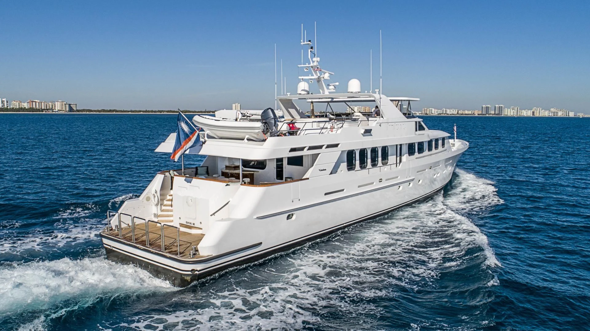 a large white boat on the water aboard SEAQUEST Yacht for Sale