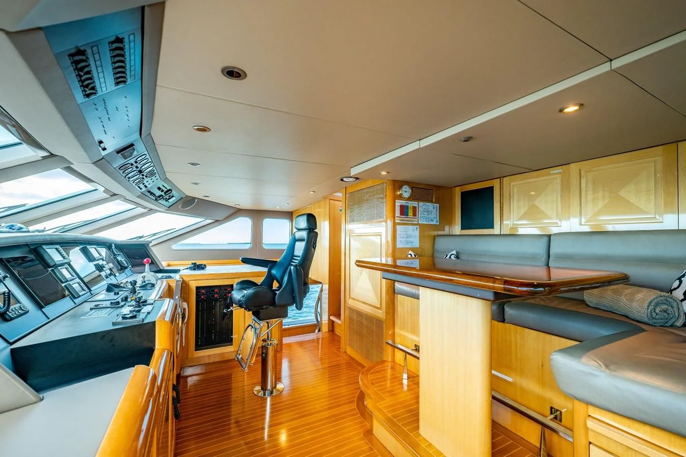 inside of a building with tables and chairs aboard SEAQUEST Yacht for Sale