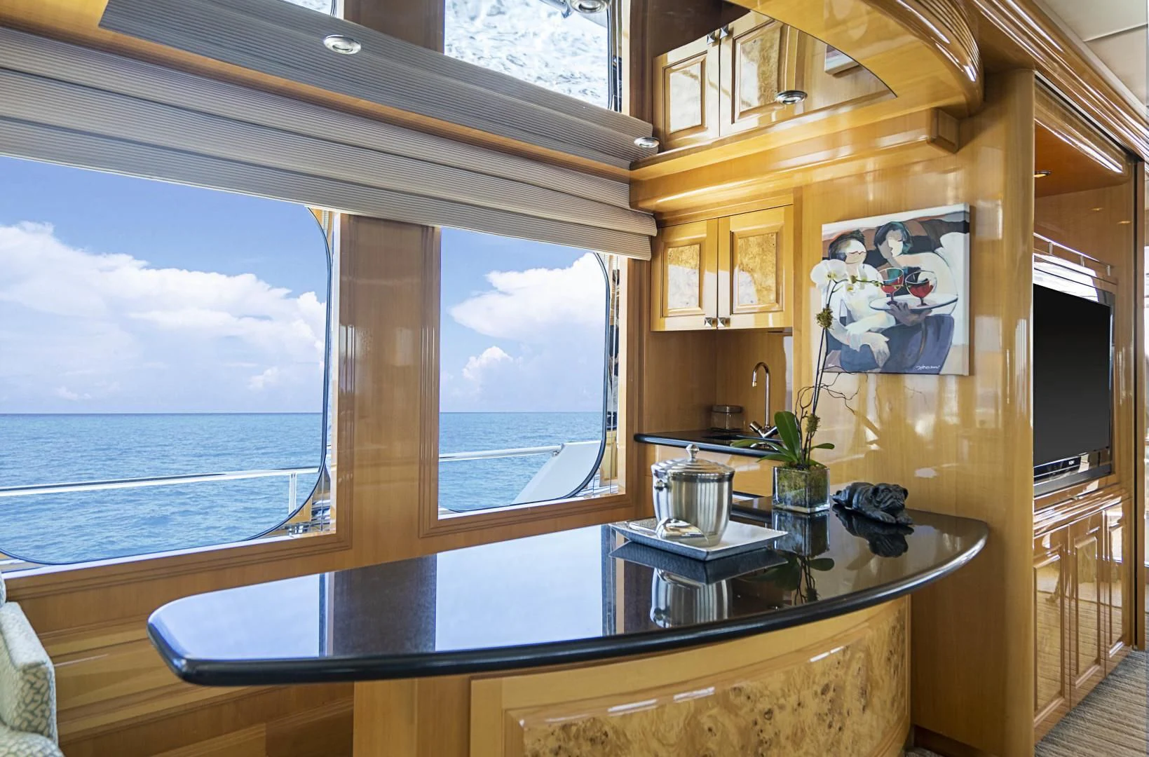 a kitchen with a large window aboard SEAQUEST Yacht for Sale