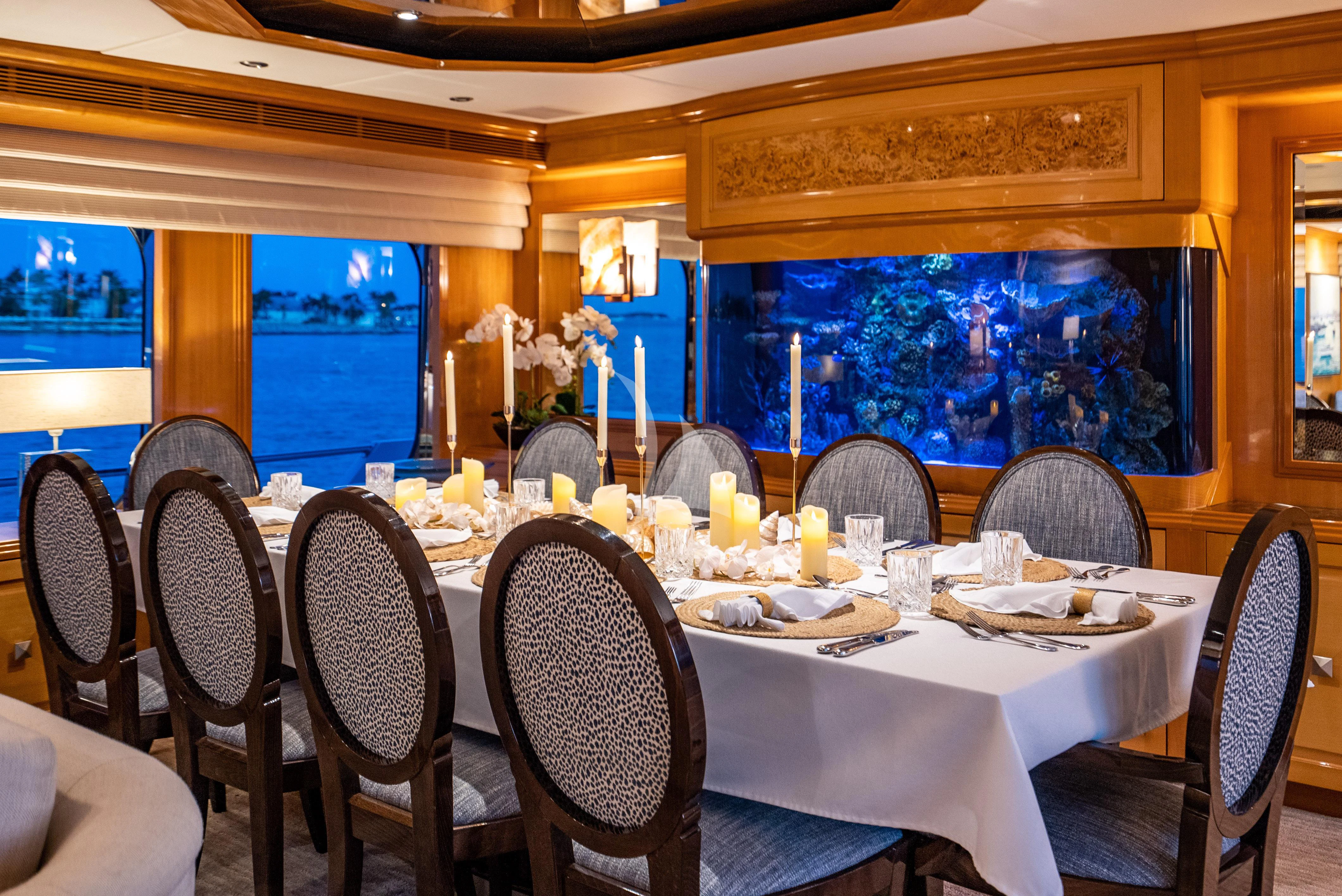 a table set for a meal aboard SEAQUEST Yacht for Sale