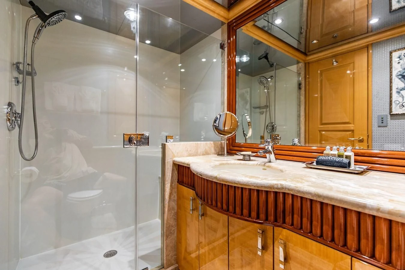 a bathroom with a shower and sink aboard SEAQUEST Yacht for Sale
