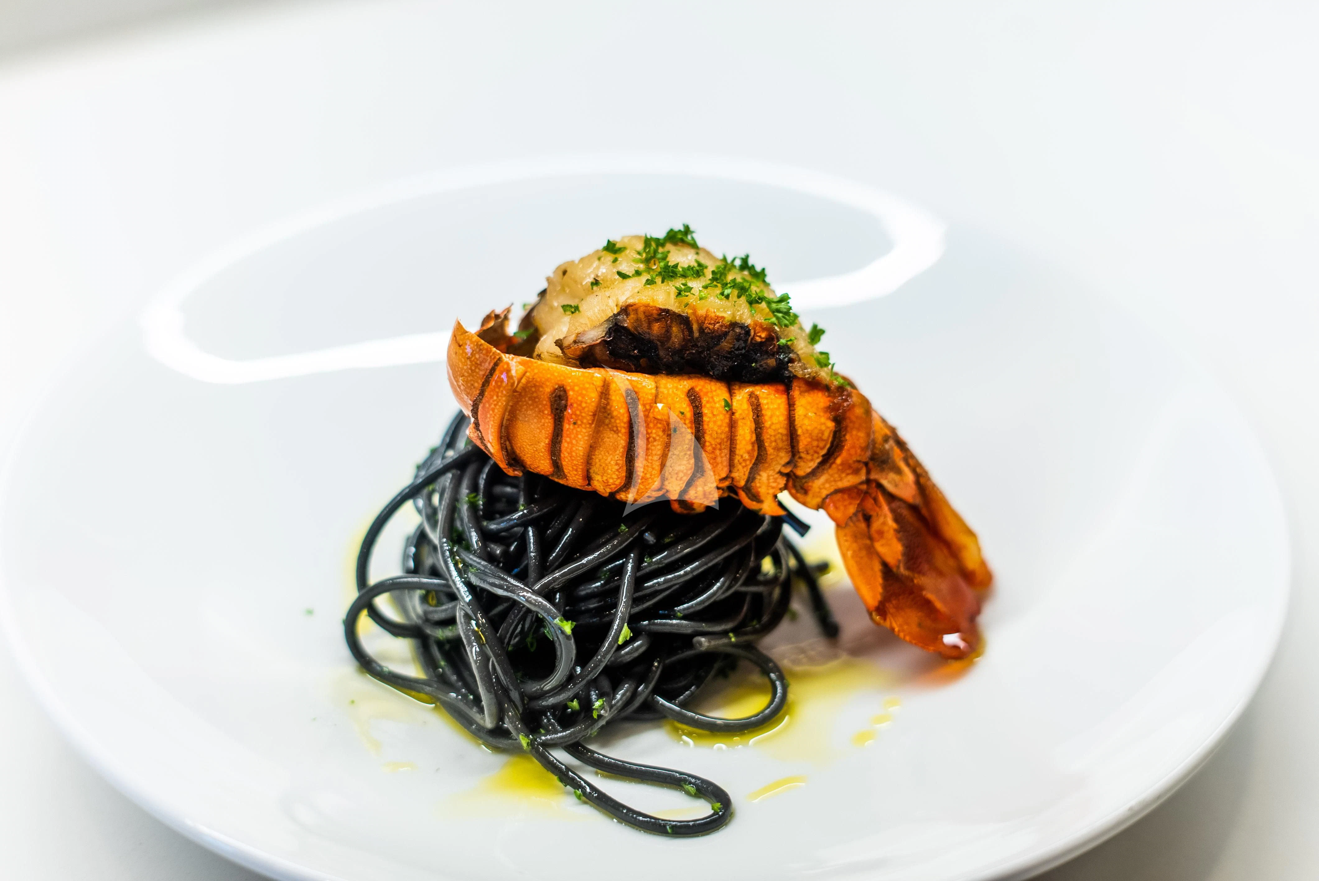 a plate of food aboard SEAQUEST Yacht for Sale