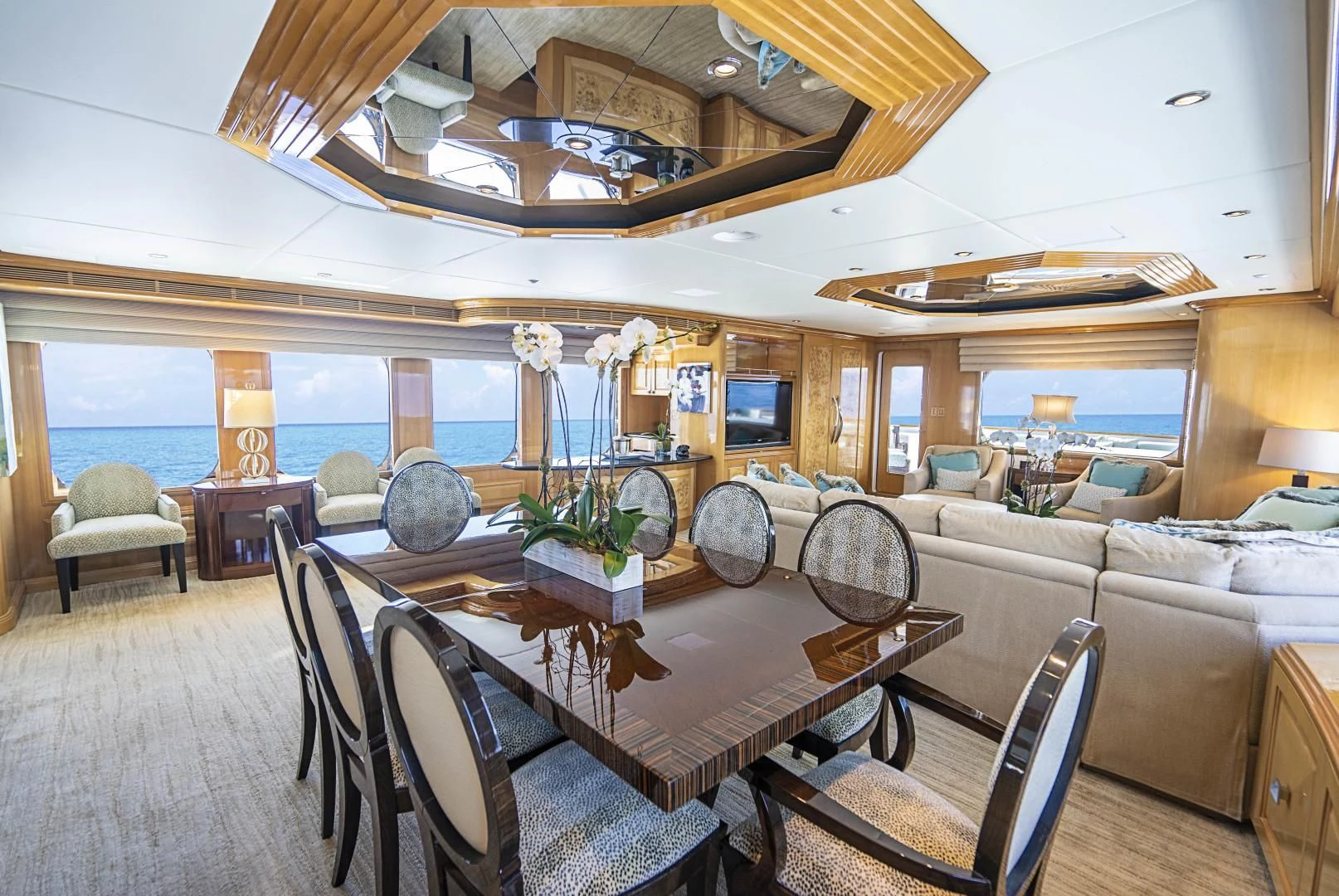 a large living room with a large open window aboard SEAQUEST Yacht for Sale