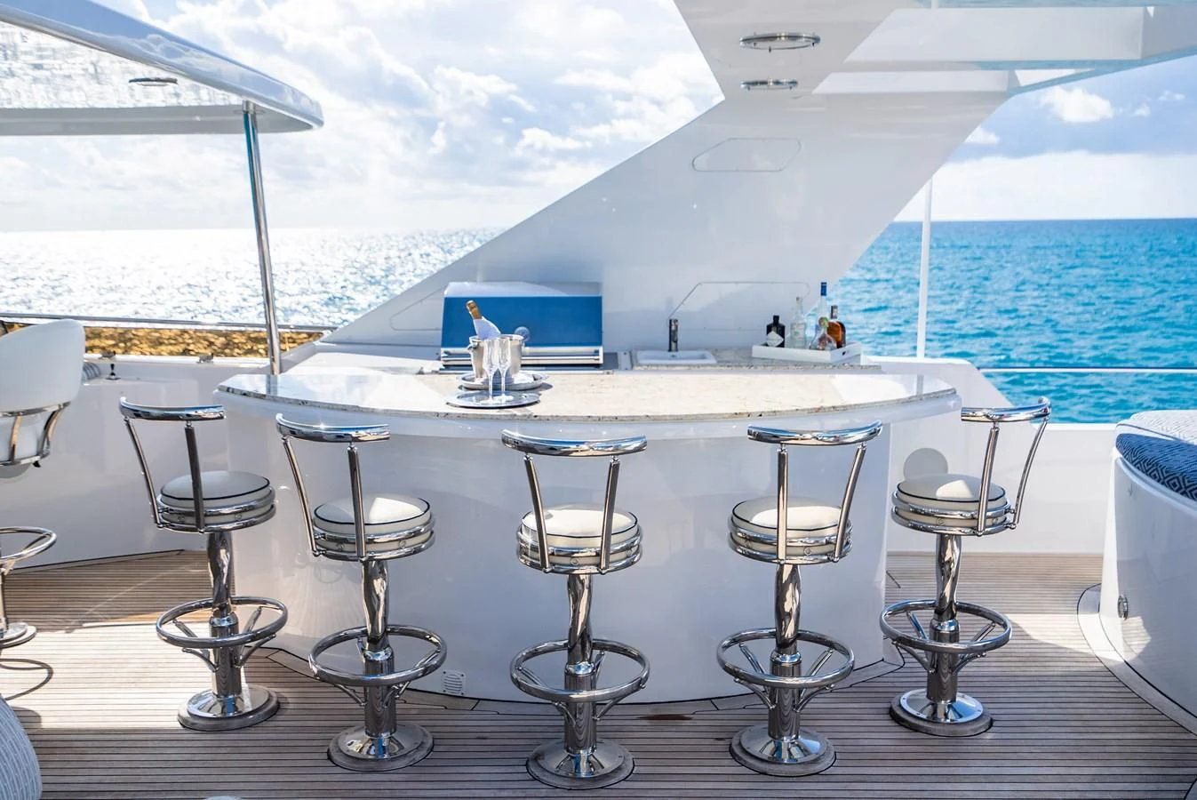 a table with chairs on it aboard SEAQUEST Yacht for Sale