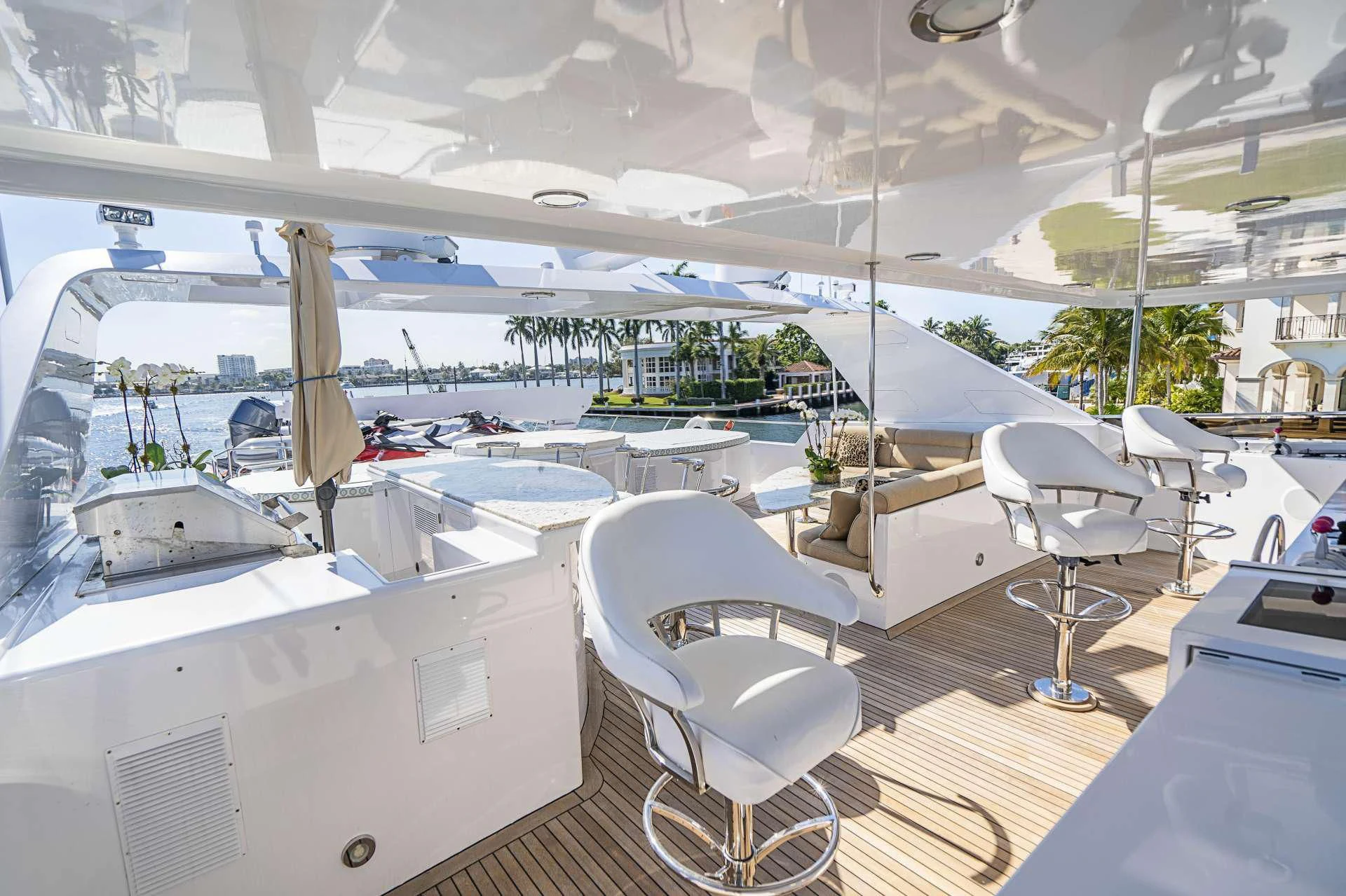 a boat with a chair and a table on it aboard SEAQUEST Yacht for Sale