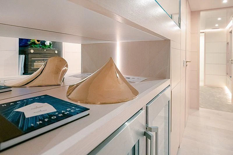 a tablet on a table aboard KIMOJO Yacht for Sale