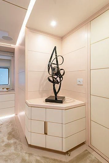 a statue on a stand aboard KIMOJO Yacht for Sale