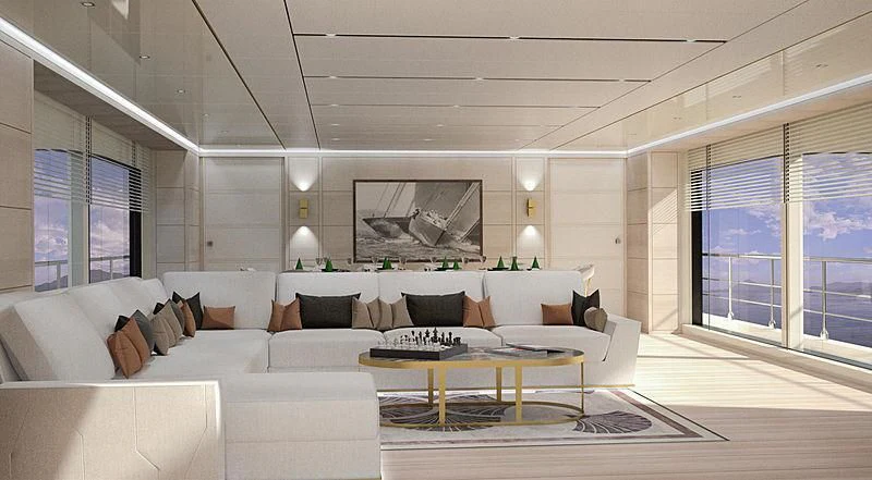 a living room with a large white couch and a large window aboard KIMOJO Yacht for Sale
