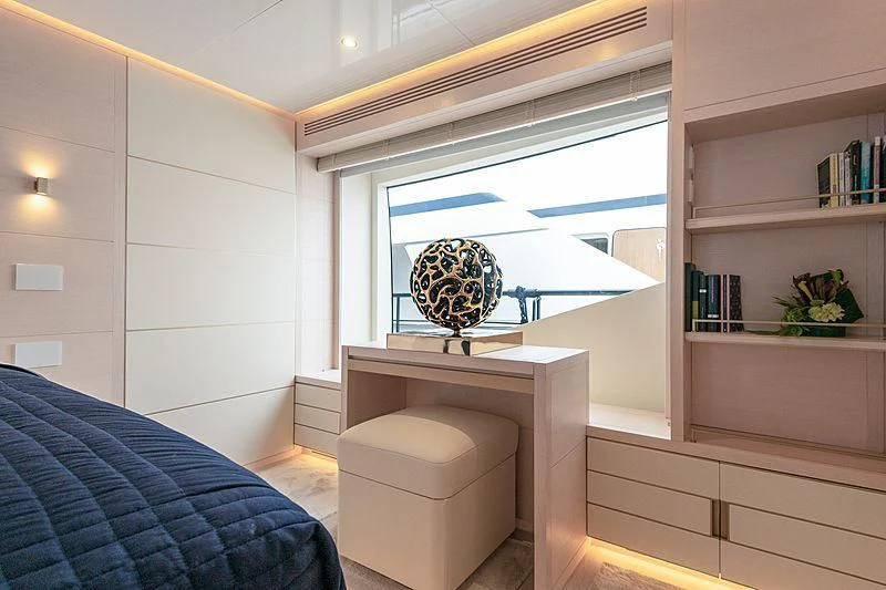 a room with a window and a couch aboard KIMOJO Yacht for Sale
