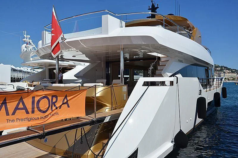 a boat docked at a port aboard KIMOJO Yacht for Sale