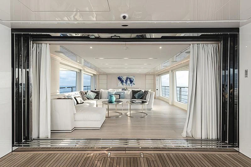 a room with a couch and a table aboard KIMOJO Yacht for Sale