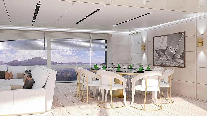 a room with a table and chairs aboard KIMOJO Yacht for Sale