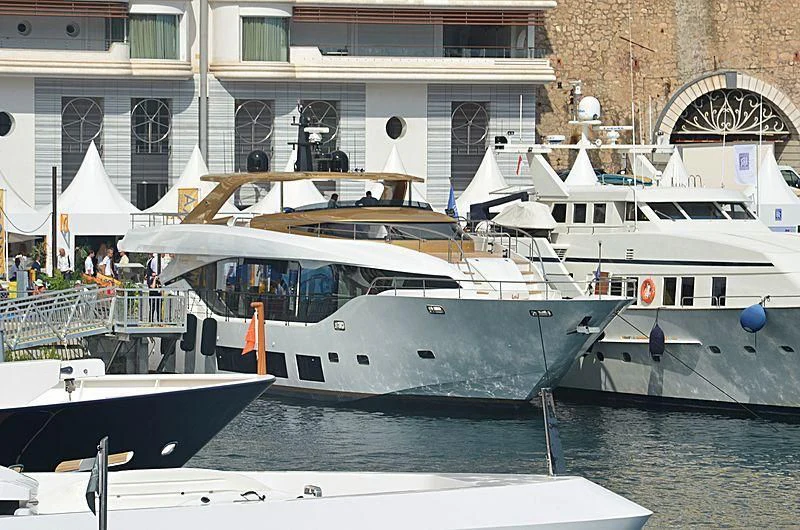 several boats docked in a harbor aboard KIMOJO Yacht for Sale