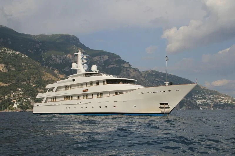 a white yacht on the water aboard KWIKUMAT Yacht for Sale