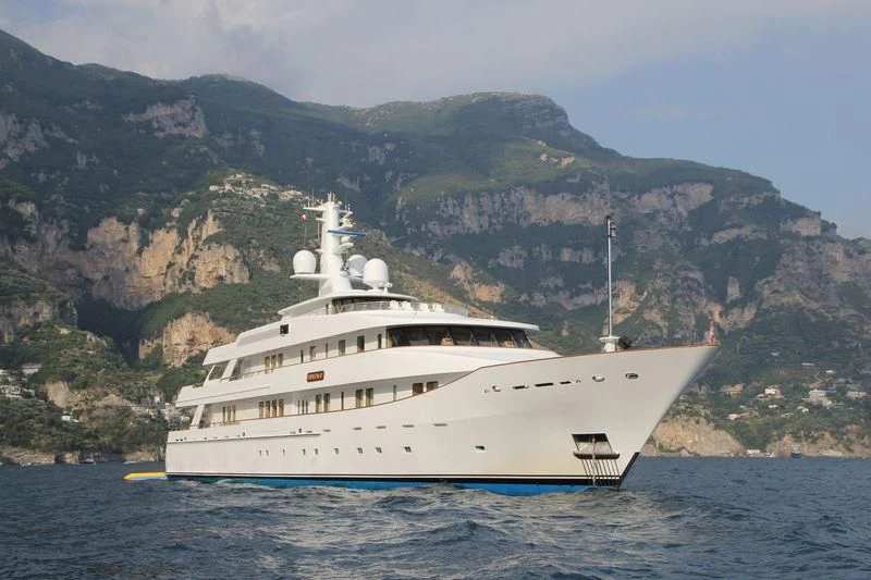 a large white boat in the water aboard KWIKUMAT Yacht for Sale