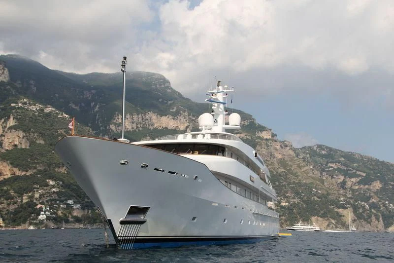 a white yacht on the water aboard KWIKUMAT Yacht for Sale
