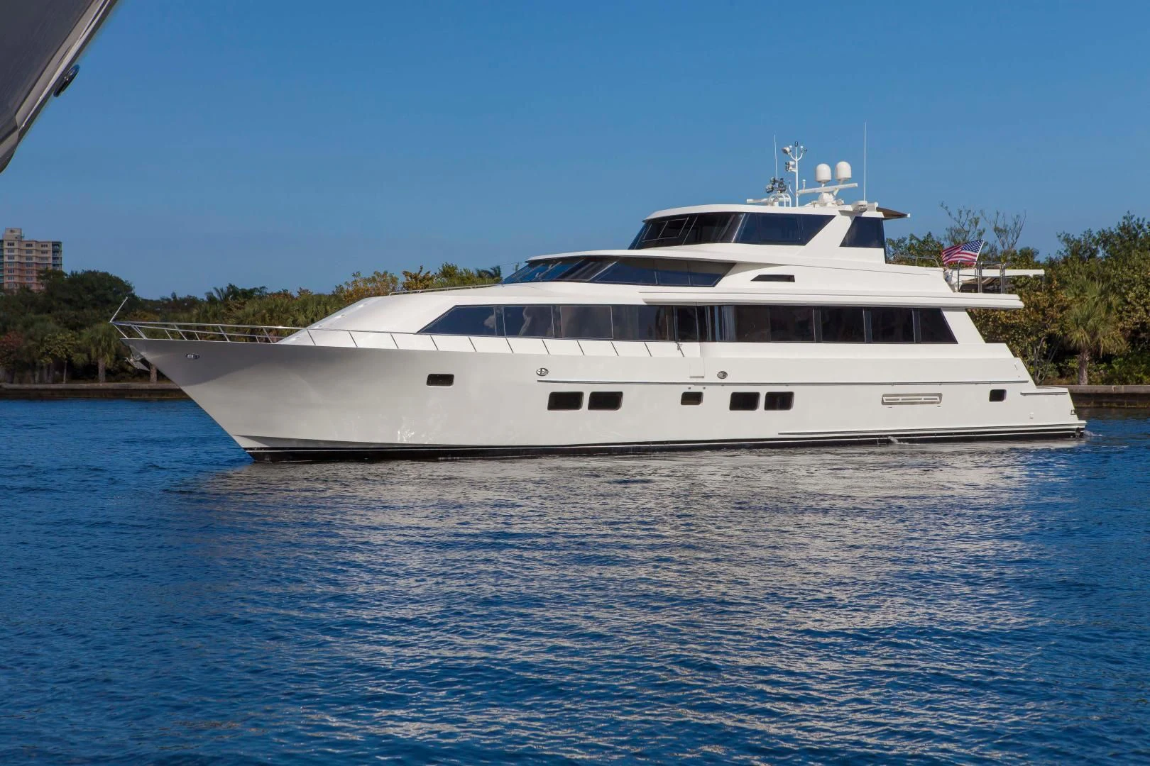 a white yacht in the water aboard MONARCH Yacht for Sale