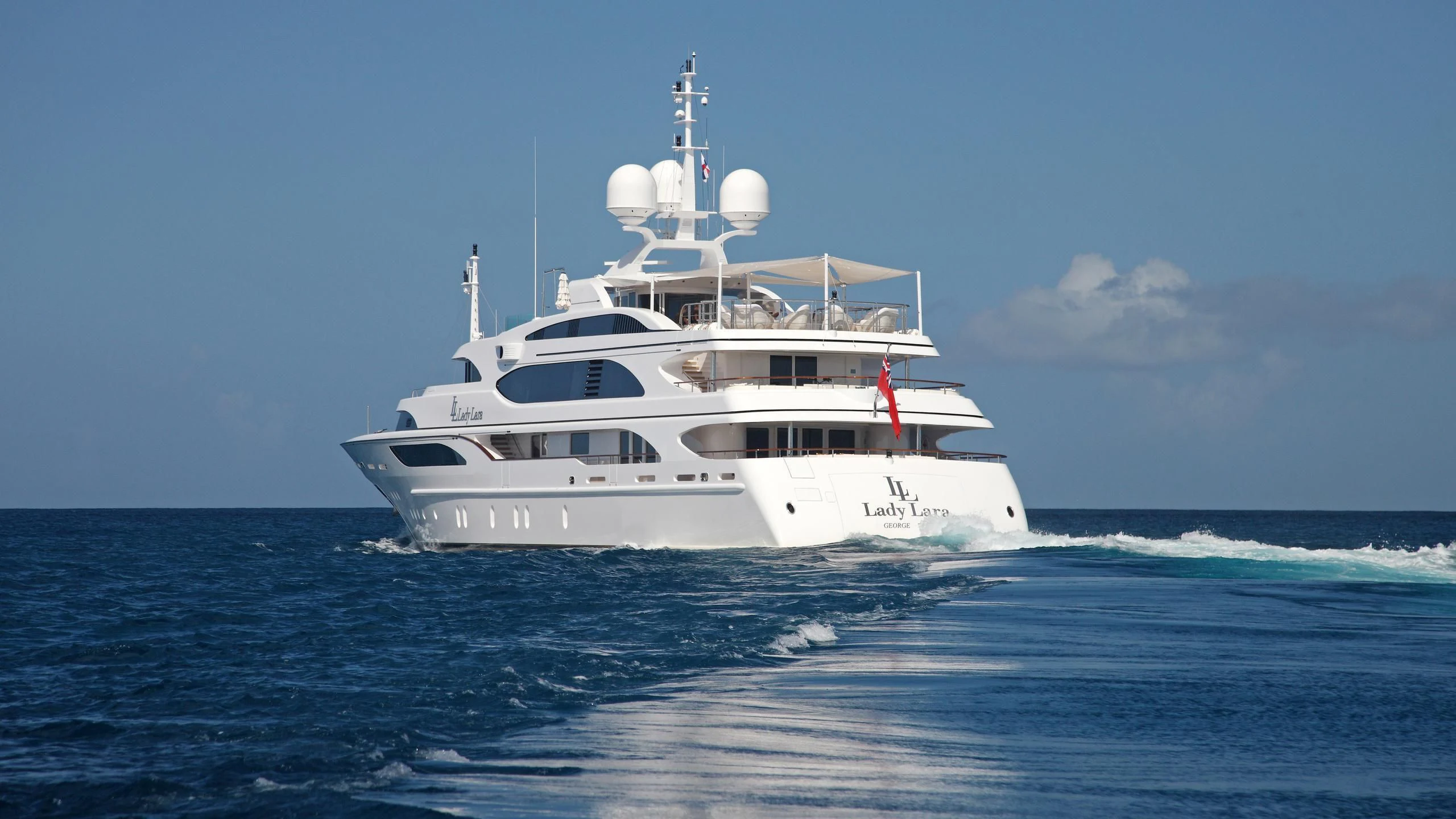 a white boat in the water aboard MONARCH Yacht for Sale