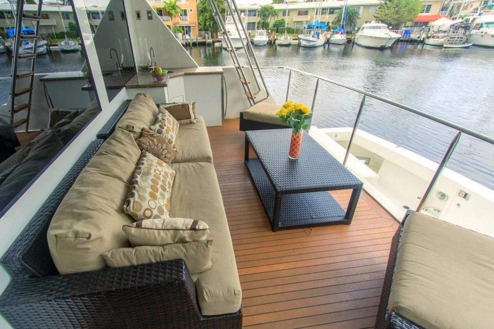 a table on a deck aboard MONARCH Yacht for Sale