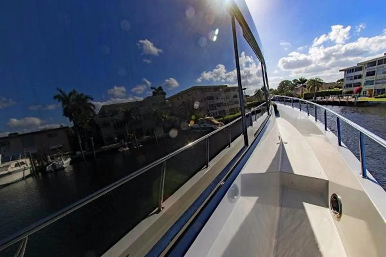 a pool with a building in the background aboard MONARCH Yacht for Sale