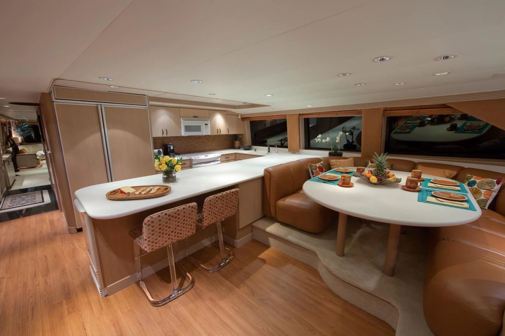 a kitchen and living room aboard MONARCH Yacht for Sale