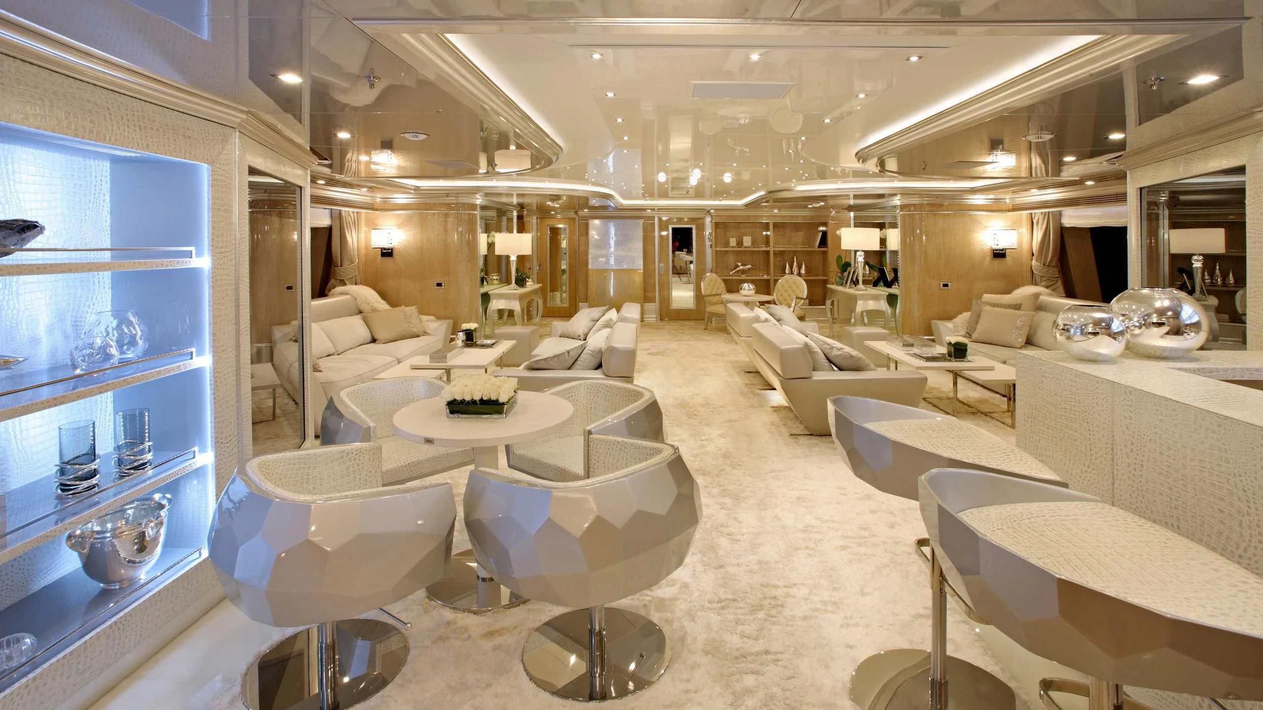 a room with a couch and a table aboard MONARCH Yacht for Sale