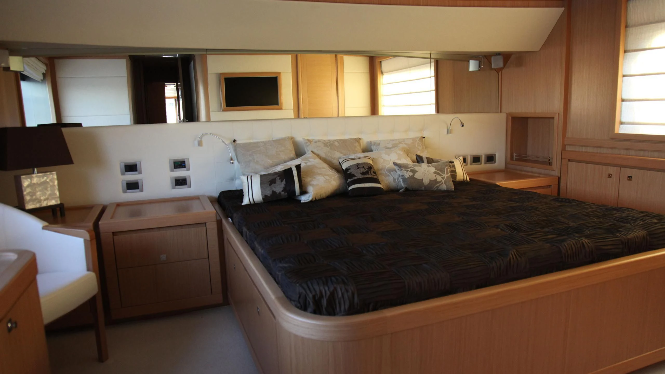 a large bed in a room aboard ULYSSIA Yacht for Sale