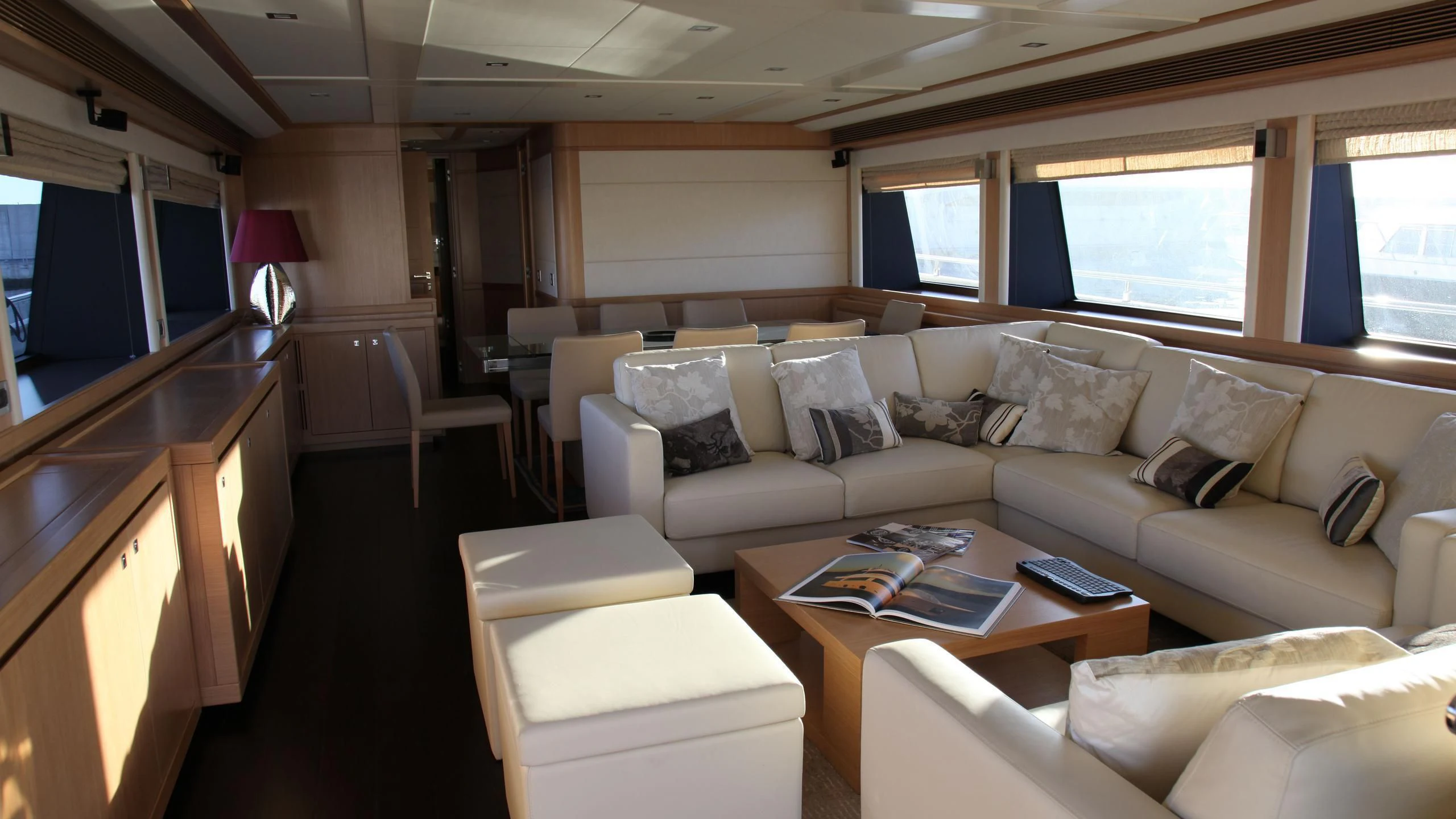 a living room with a couch and a coffee table aboard ULYSSIA Yacht for Sale