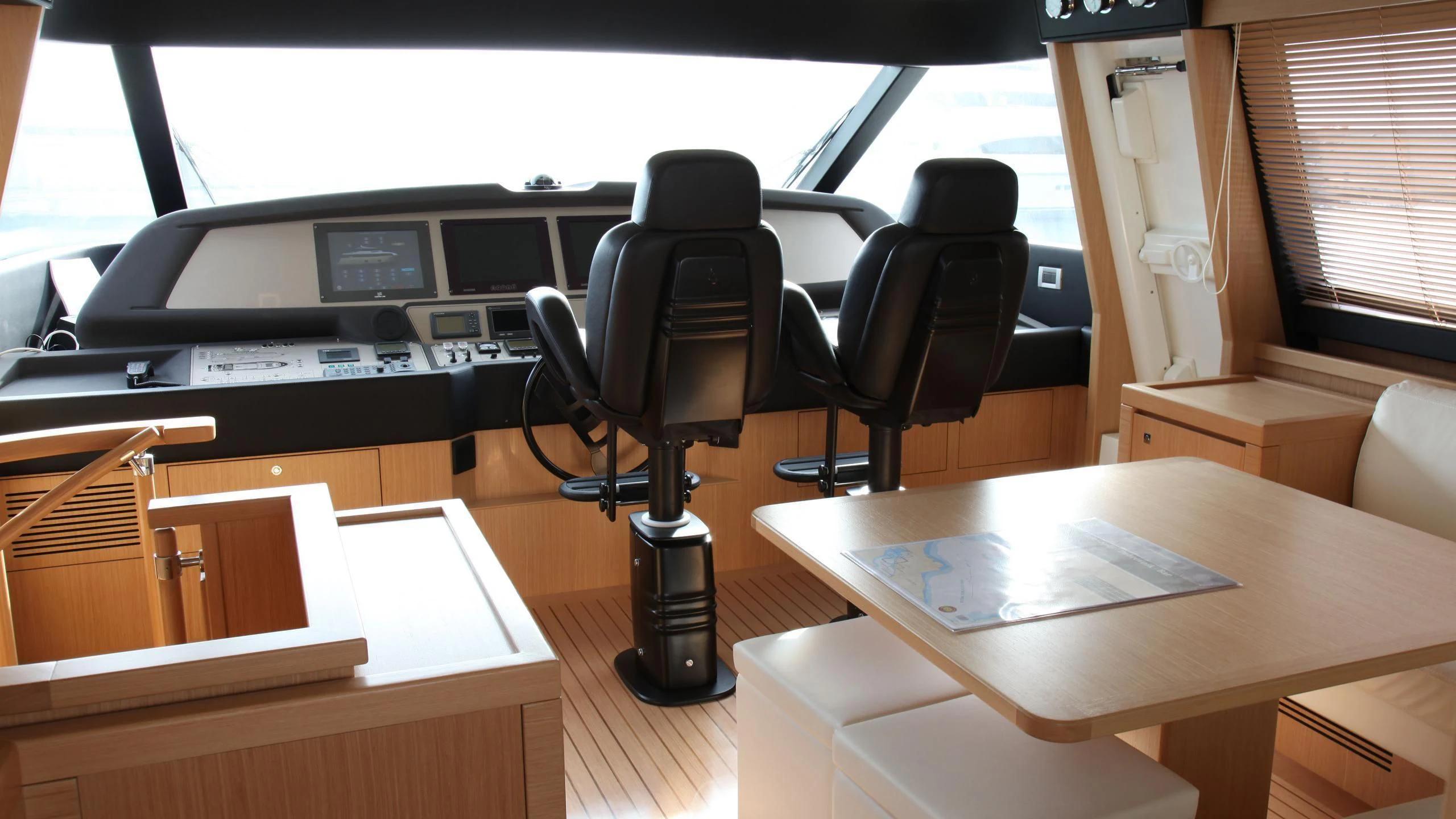 a black chair in a room aboard ULYSSIA Yacht for Sale